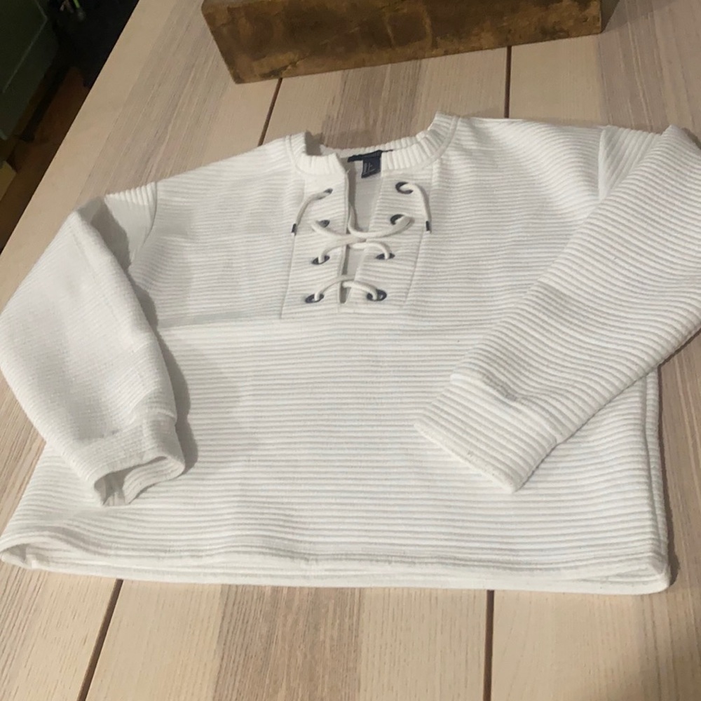white lace up sweater.